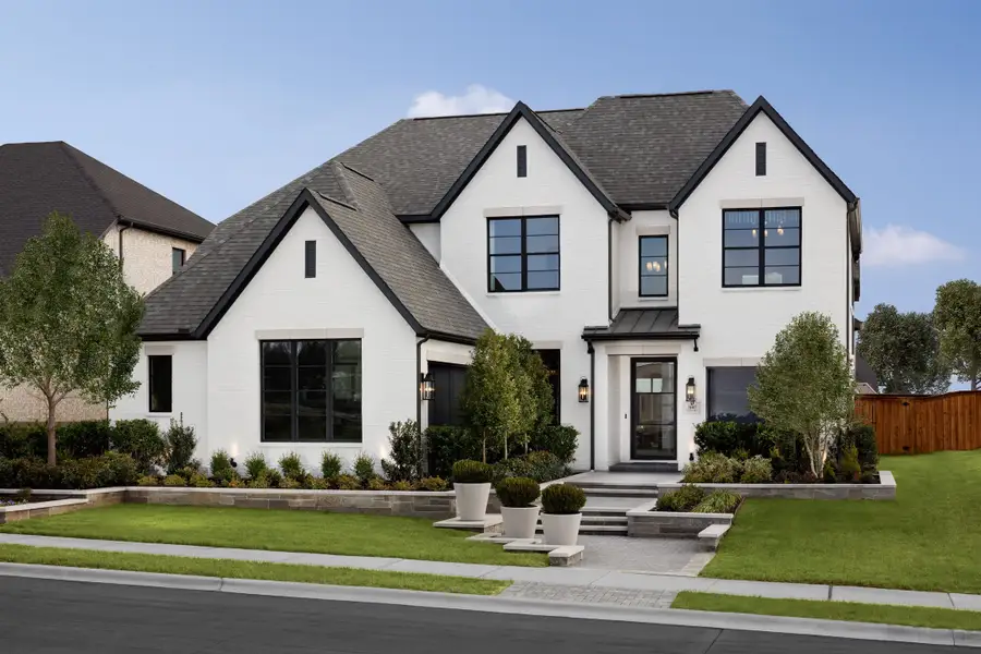 Front exterior of a home in the The Homestead community, located in Rockwall, TX (Image 2). Front exterior of a home in the The Homestead community, located in Rockwall, TX (Image 2).