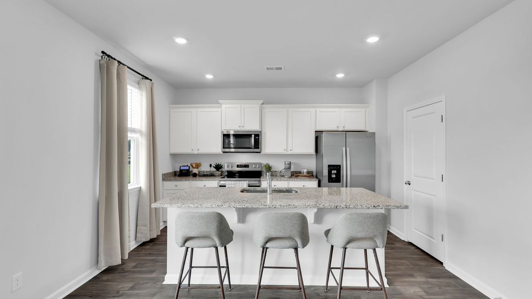 Furnished interior in a model home at The Ranch in Holly Hill (Image 4).