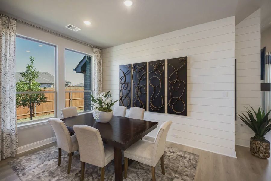 Furnished interior in a model home at Heartland 40's in Heartland (Image 12).