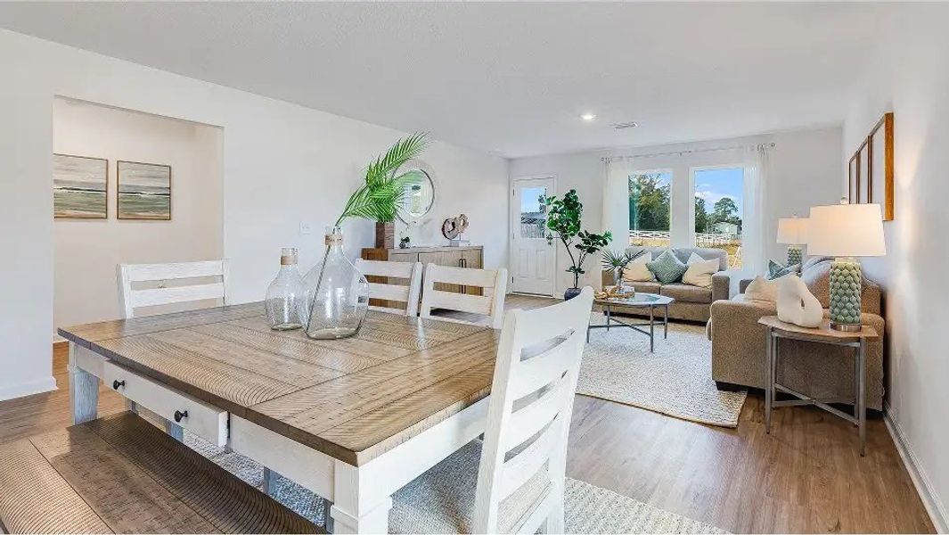 Furnished interior in a model home at Eagle's Ridge: Watermill in Pace (Image 4).