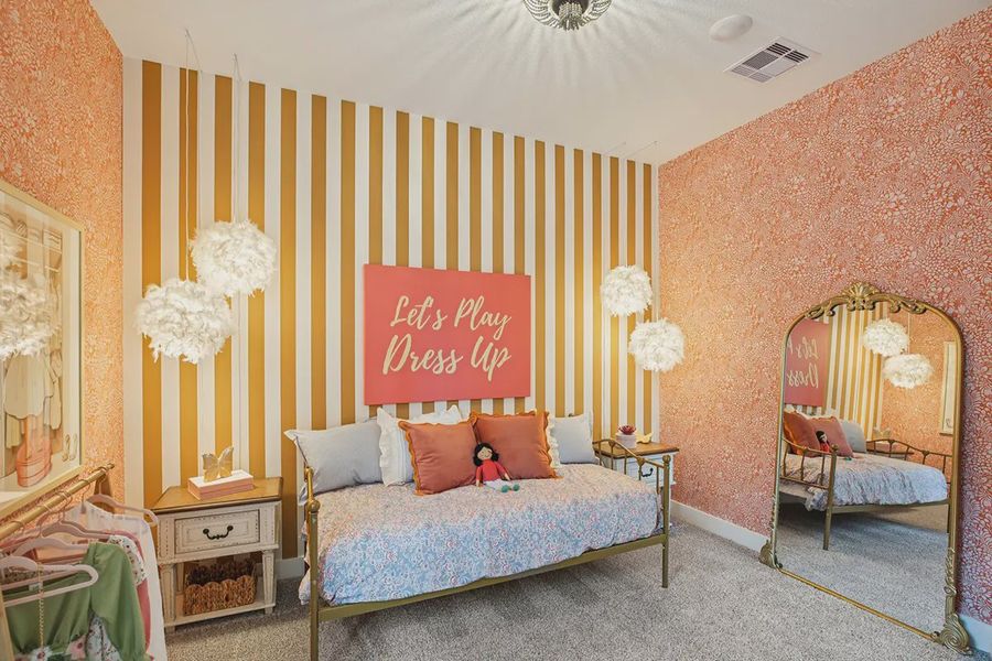 Furnished interior in a model home at Meridiana 50's in Manvel (Image 36).