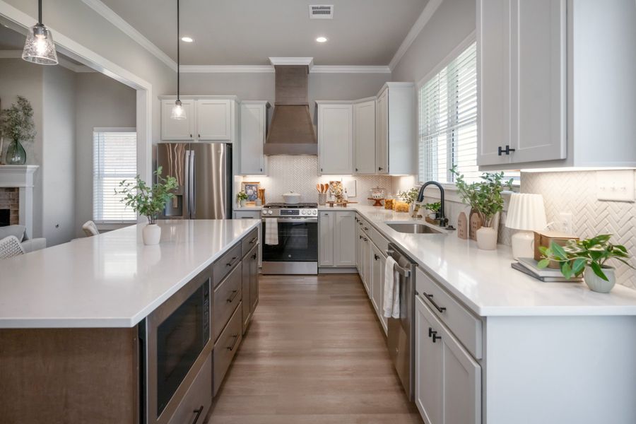 Furnished interior in a model home at Greens Prairie Reserve in College Station (Image 9).