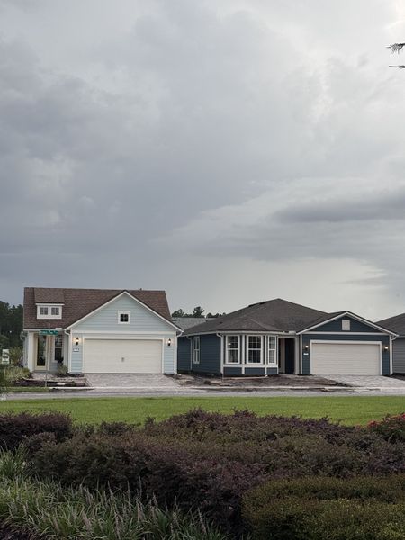 Charming homes with elegant garages and a lush yard in Summer Bay at Grand Oaks by Pulte Homes (St. Augustine, FL). Charming homes with elegant garages and a lush yard in Summer Bay at Grand Oaks by Pulte Homes (St. Augustine, FL).