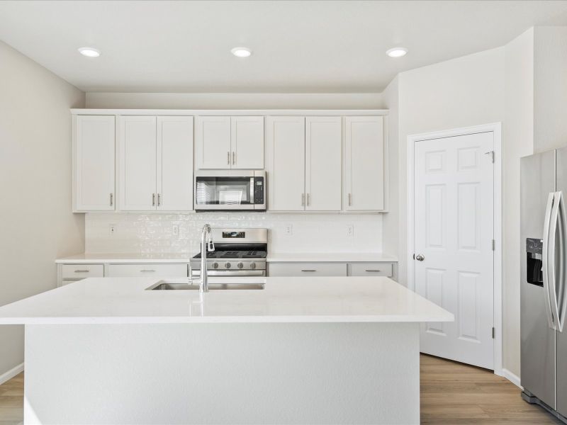 Furnished interior in a model home at Buffalo Highlands: The Flora Collection in Commerce City (Image 17).