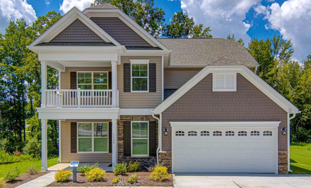 Front exterior of a home in the Arbordale Reserve community, located in Elgin, SC (Image 9). Front exterior of a home in the Arbordale Reserve community, located in Elgin, SC (Image 9).