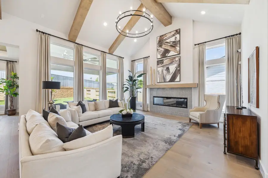 Furnished interior in a model home at The Woodlands Hills – 65' in Willis (Image 3). Furnished interior in a model home at The Woodlands Hills – 65' in Willis (Image 3).