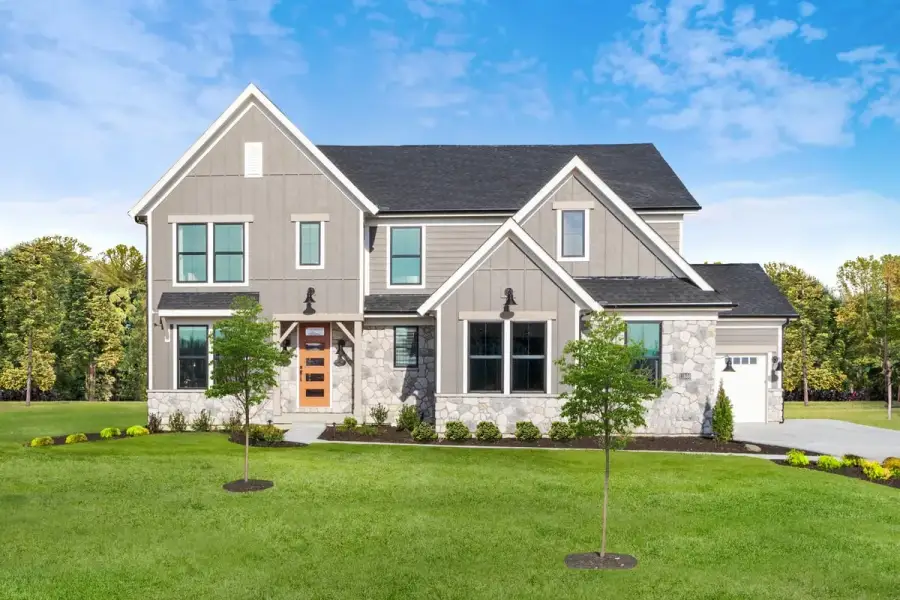 Front exterior of a home in the Solmere community, located in Cumming, GA (Image 17).