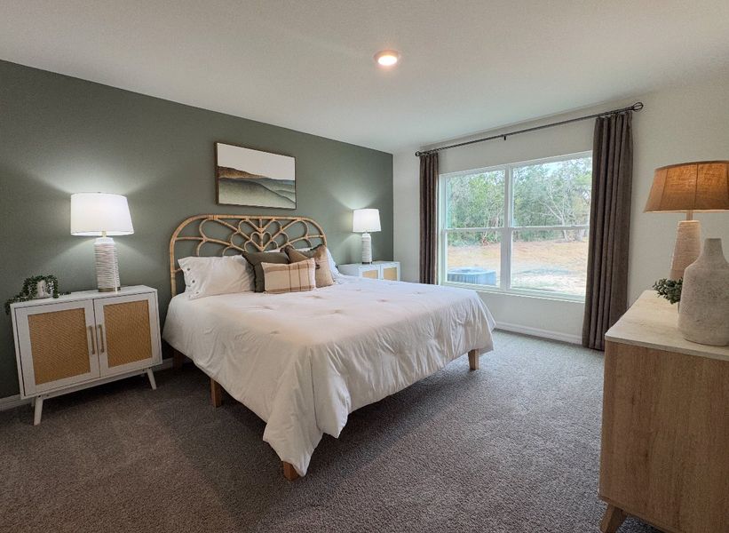 A serene bedroom with a rattan headboard, soft lighting, and a large window overlooking the outdoors.