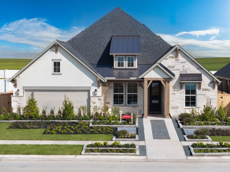 Front exterior of a home in the Valencia: Hilltop Collection community, located in Manvel, TX (Image 3).