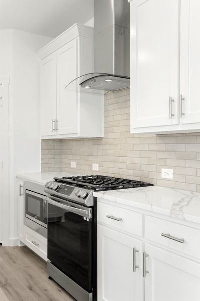 Furnished interior in a model home at Windsong Ranch Townhomes in Prosper (Image 30).