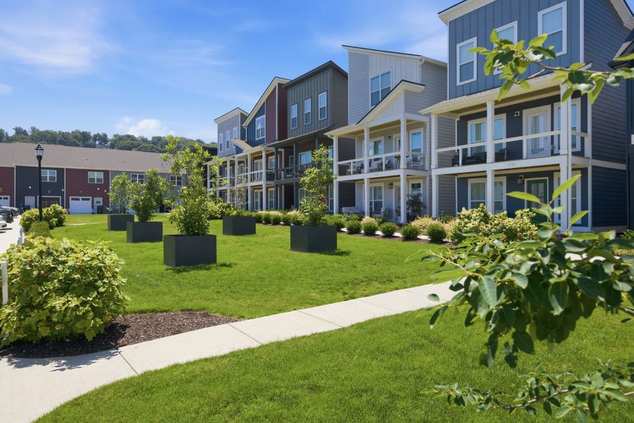 Residents enjoy shared green spaces and gathering areas designed to encourage connection and outdoor living at The Parks of Mill Town.