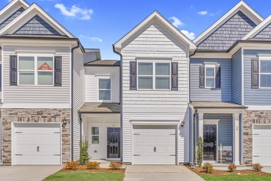 Front exterior of a home in the The Townes at Cape Overlook community, located in Lillington, NC (Image 13). Front exterior of a home in the The Townes at Cape Overlook community, located in Lillington, NC (Image 13).
