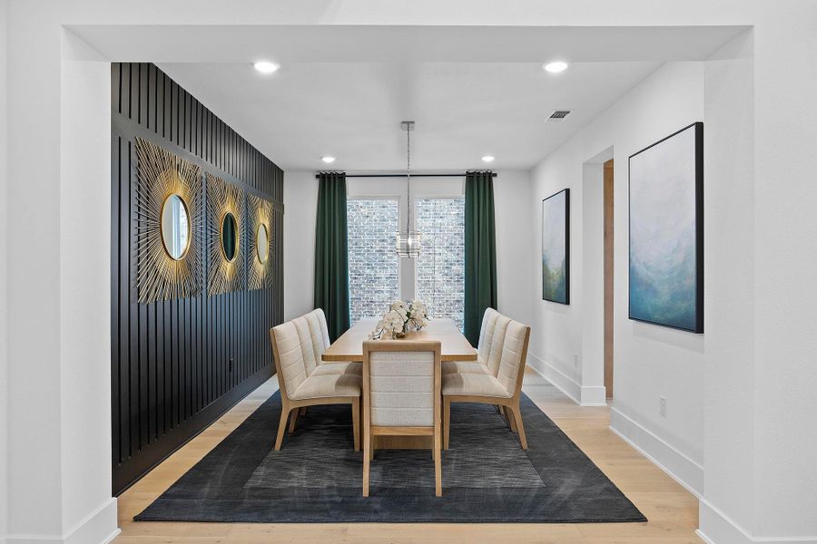 Furnished interior in a model home at New Haven - 60' in Manor (Image 20).