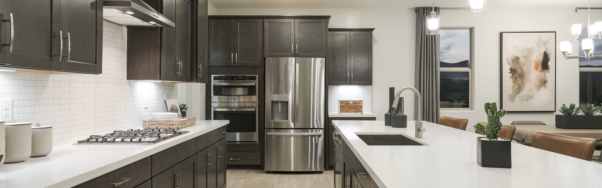 Furnished interior in a model home at Windrose V in Waddell (Image 11).