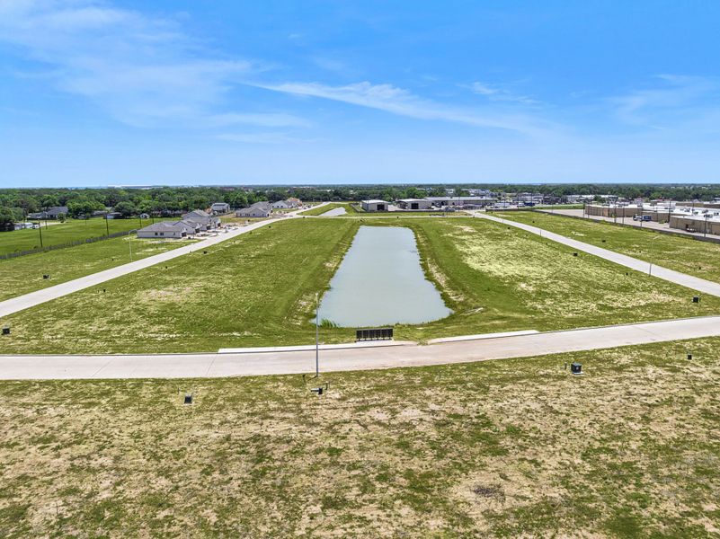 A golf course with a green field.