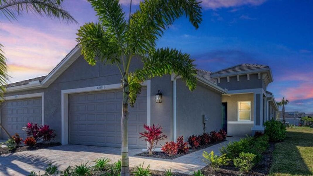 Front exterior of a home in the The Laurels community, located in Parrish, FL (Image 43).