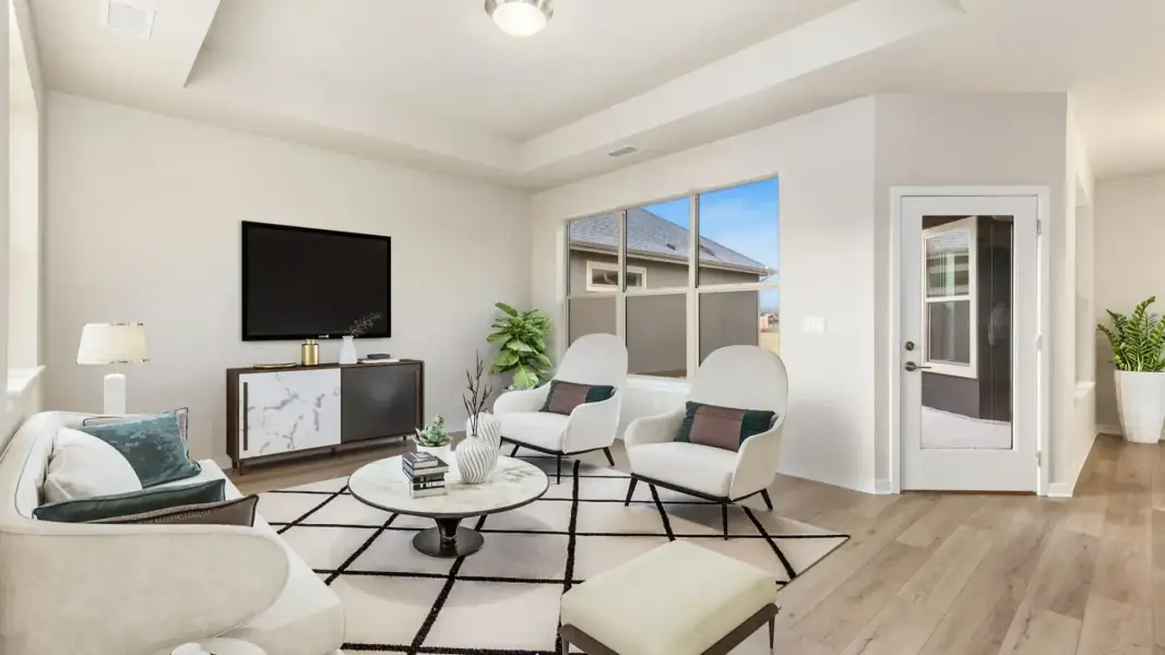 Furnished interior in a model home at The Courtyards at Lupton Village in Fort Lupton (Image 6).