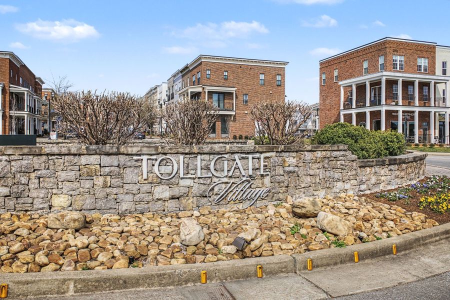 Entrance to the Tollgate Village Town Center community in Franklin, TN, featuring signage and landscaping (Image 8).