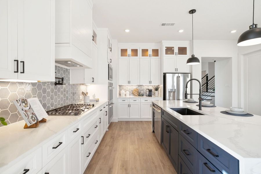 Furnished interior in a model home at Lily Creek at Sutton Fields in Aubrey (Image 60).