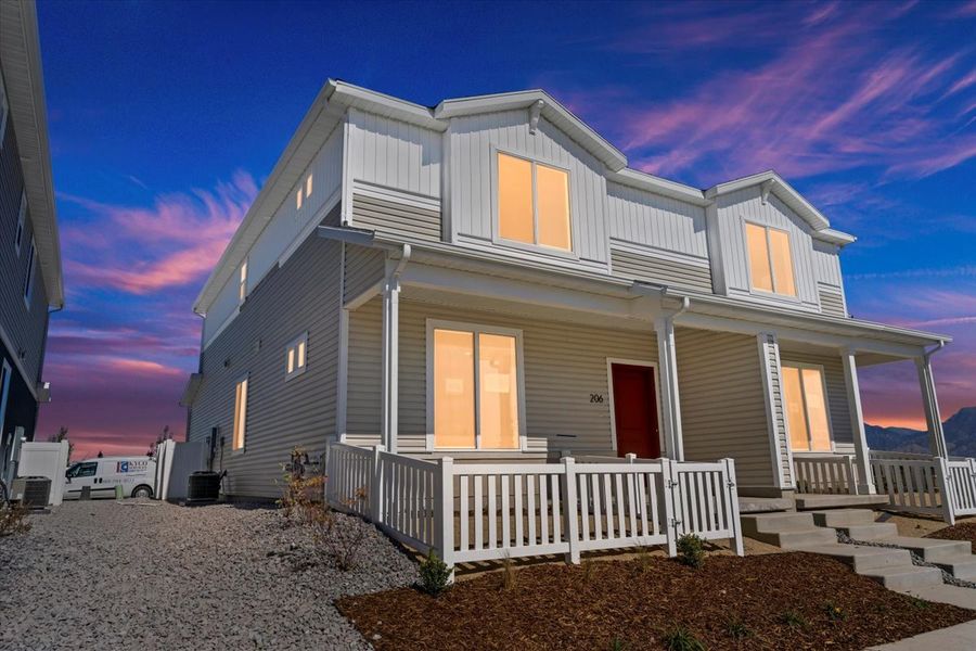 Front exterior of a home in the Ascent Collection at Green Valley Ranch community, located in Aurora, CO (Image 3).