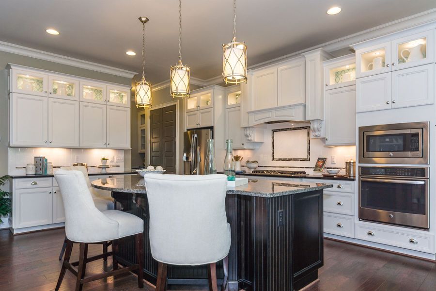 Furnished interior in a model home at Holly Springs – 12 Oaks - Robuck Homes in Garner (Image 9). Furnished interior in a model home at Holly Springs – 12 Oaks - Robuck Homes in Garner (Image 9).