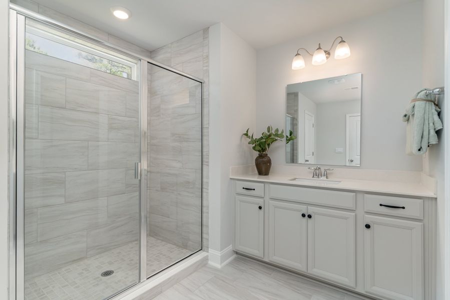 Furnished interior in a model home at Waterbridge in Myrtle Beach (Image 52).