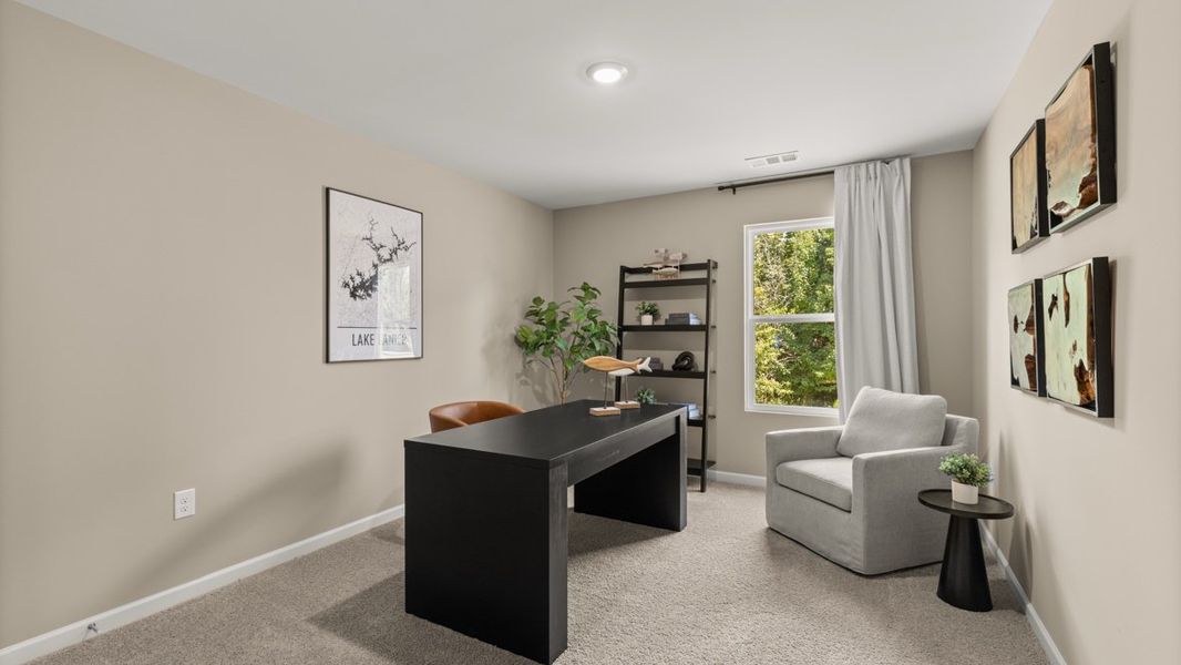 Furnished interior in a model home at Grandview at Lanier in Dawsonville (Image 27).