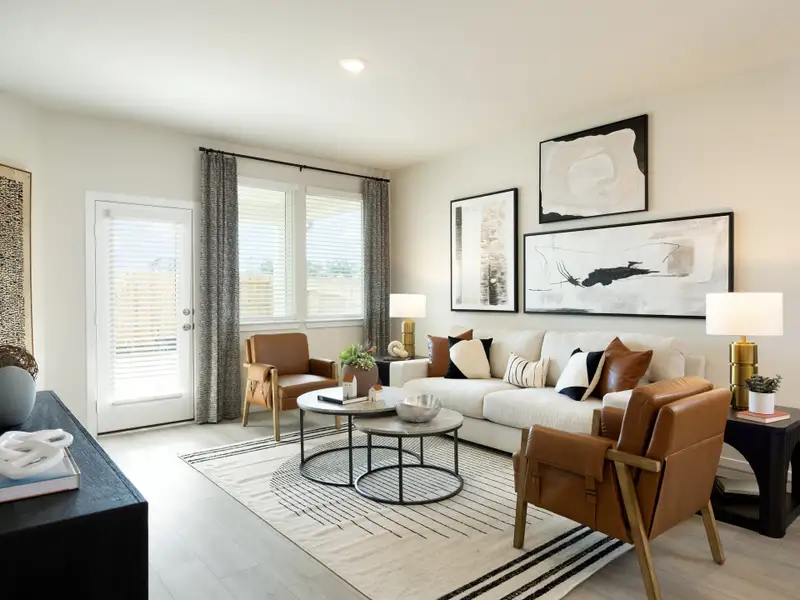 Furnished interior in a model home at Granger Pointe - Traditional Series in Conroe (Image 5).