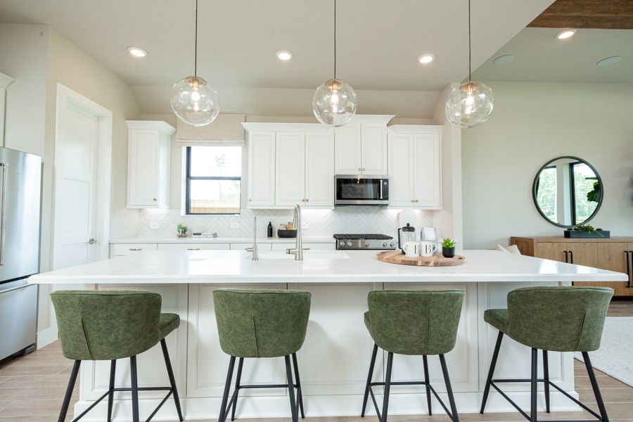 Furnished interior in a model home at The Highlands in Porter (Image 3).