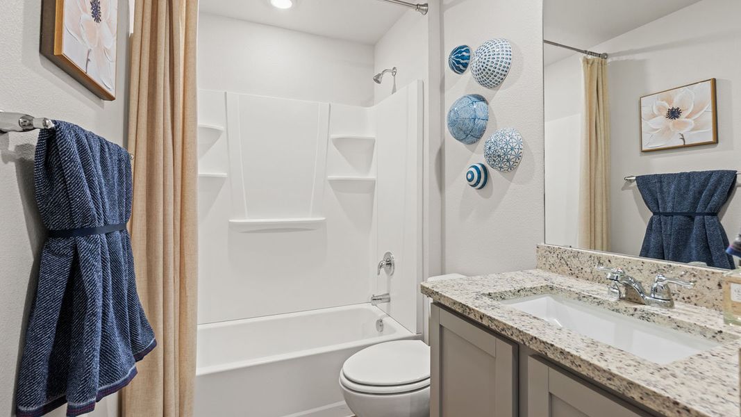 Furnished interior in a model home at Royal Oak South in Corpus Christi (Image 21).