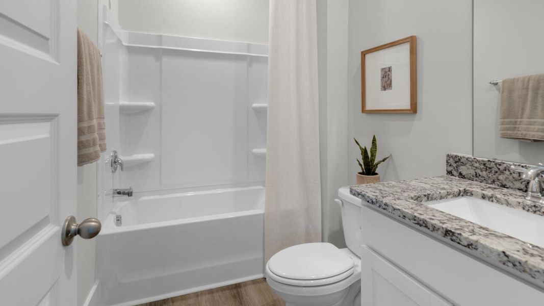 Furnished interior in a model home at Surfside Landing in Hubert (Image 17).