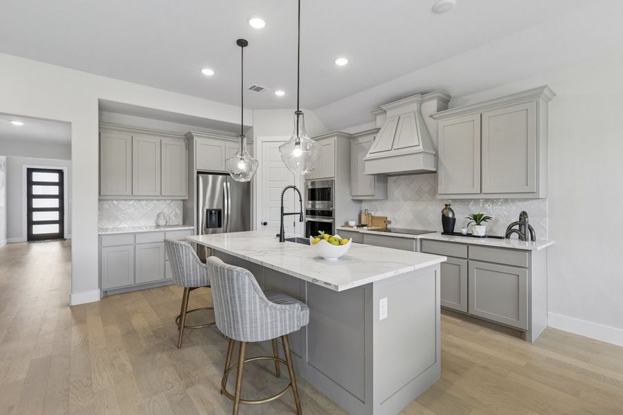 Furnished interior in a model home at Ten Mile Creek in DeSoto (Image 7).