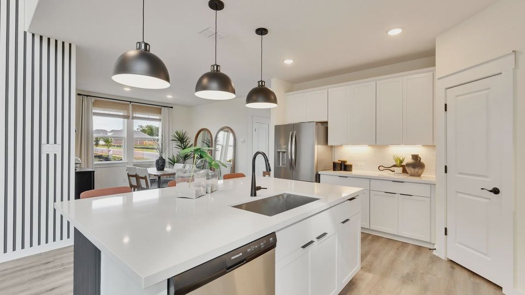 Furnished interior in a model home at Creeks Crossing in Elgin (Image 22).