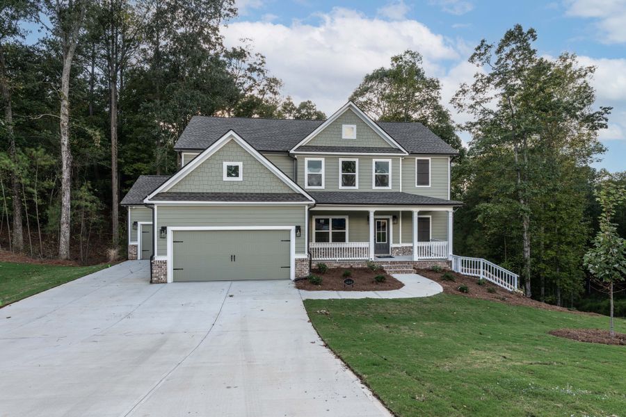 Front exterior of a home in the Woodland Hills community, located in Loganville, GA (Image 17). Front exterior of a home in the Woodland Hills community, located in Loganville, GA (Image 17).