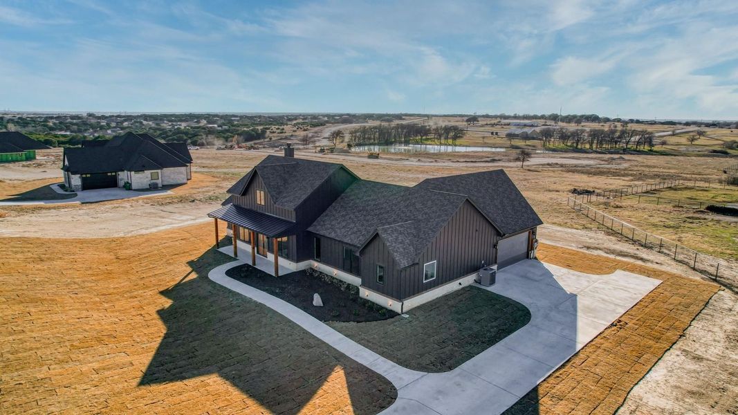 Aerial view of the Aledo Bluffs community in White Settlement, TX, showing layout and nearby surroundings (Image 1). Aerial view of the Aledo Bluffs community in White Settlement, TX, showing layout and nearby surroundings (Image 1).