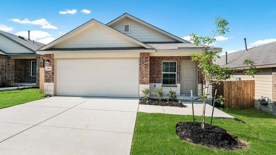 Front exterior of a home in the Veranda community, located in San Antonio, TX (Image 4).