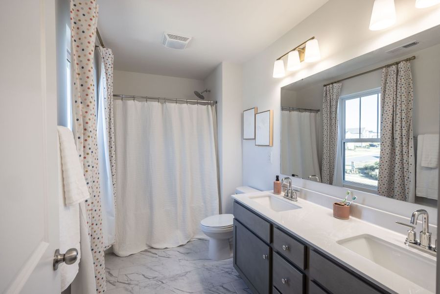 Furnished interior in a model home at Morgan Hills in Albemarle (Image 11).