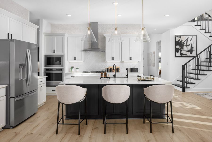 Furnished interior in a model home at The Grove at Blackhawk in Pflugerville (Image 7).