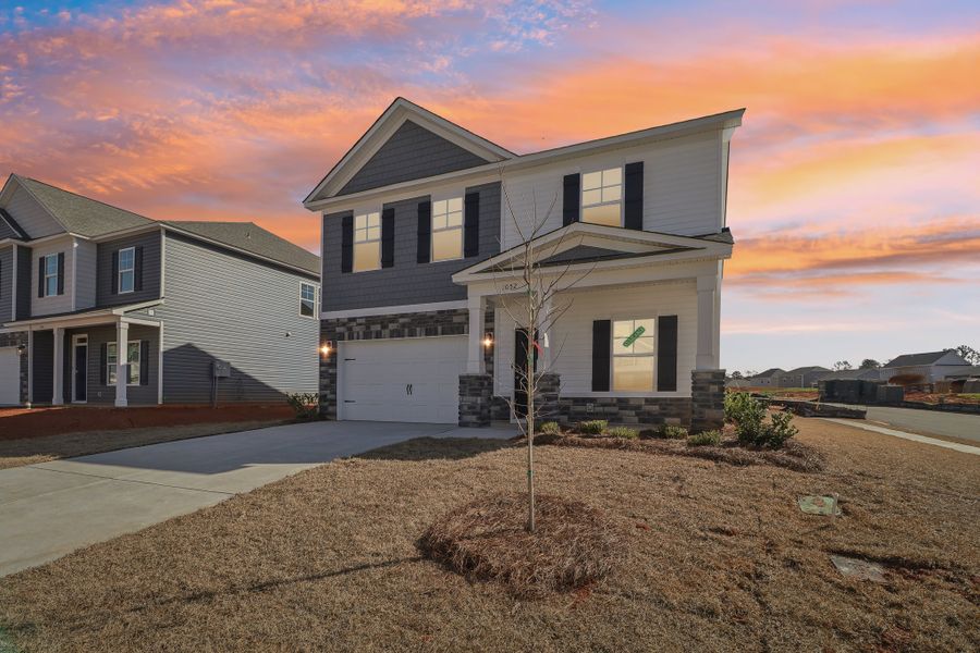 Front exterior of a home in the Carsons Landing community, located in Angier, NC (Image 2). Front exterior of a home in the Carsons Landing community, located in Angier, NC (Image 2).