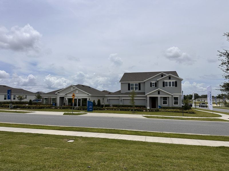 A charming gray home with manicured lawn in Trinity Lakes by Landsea Homes (Groveland, FL). A charming gray home with manicured lawn in Trinity Lakes by Landsea Homes (Groveland, FL).