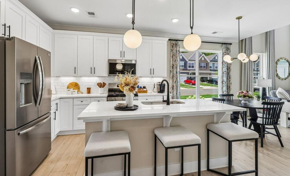 Furnished interior in a model home at Bellevue Townhomes in Greenville (Image 9).