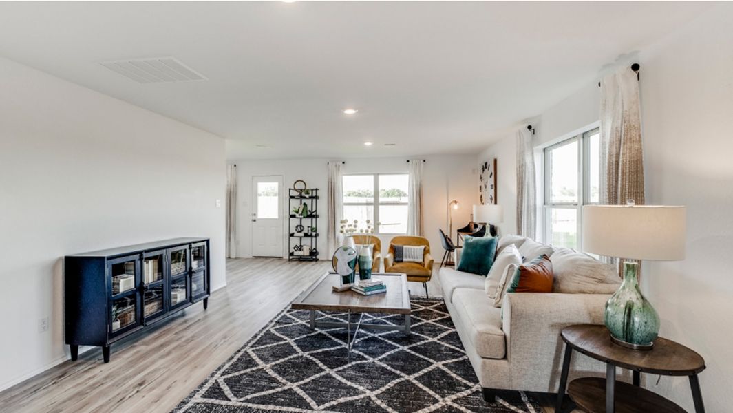 Furnished interior in a model home at Riverwood Ranch: Colonial & Cottage Collections in Angleton (Image 13).