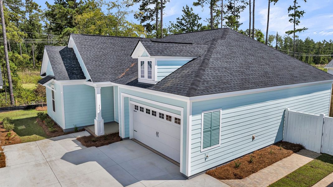 Front exterior of a home in the Nexton – Midtown – The Garden Collection community, located in Summerville, SC (Image 17).