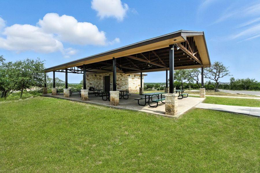 Front exterior of a home in the The Meadows at Hunters Ranch community, located in San Antonio, TX (Image 8). Front exterior of a home in the The Meadows at Hunters Ranch community, located in San Antonio, TX (Image 8).