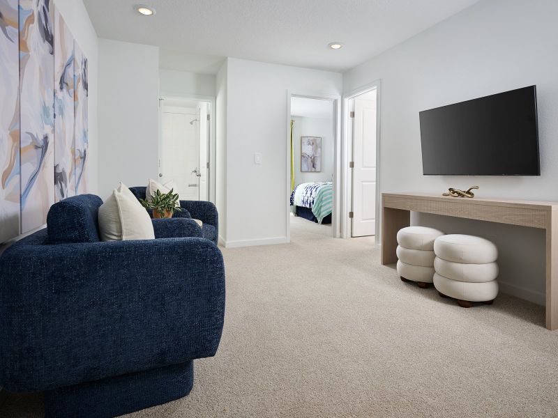 Furnished interior in a model home at The District at Oakleaf - The Grove in Middleburg (Image 7).