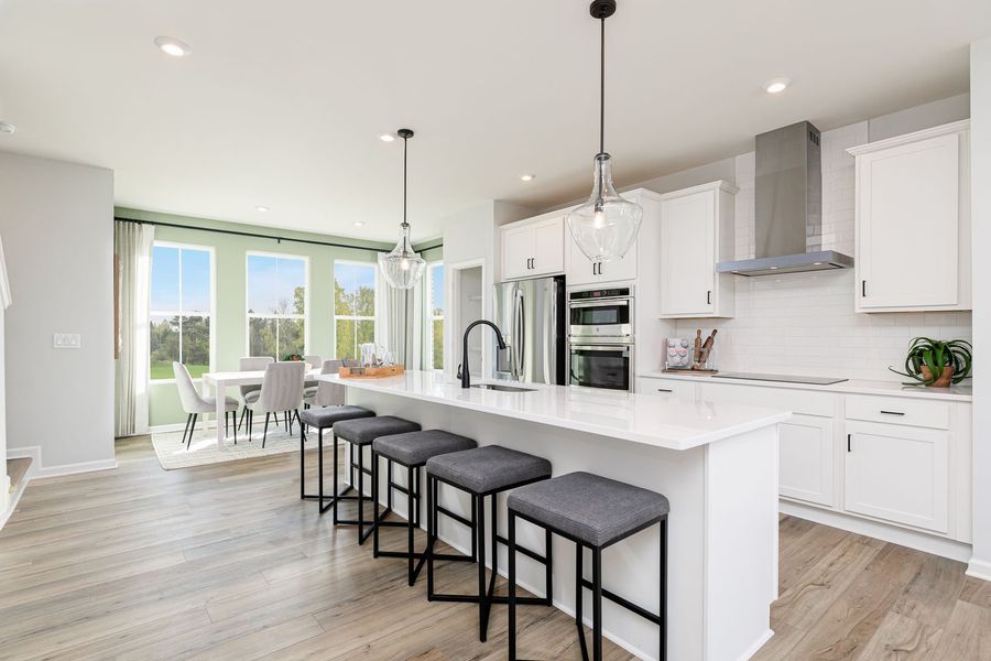 Chef inspired kitchens with large island and seating