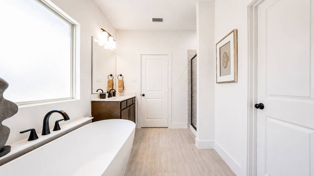 Furnished interior in a model home at Las Lomas in Forney (Image 25).
