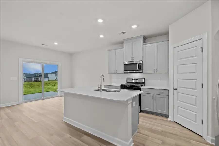 Furnished interior in a model home at Holland Park in Spartanburg (Image 4).
