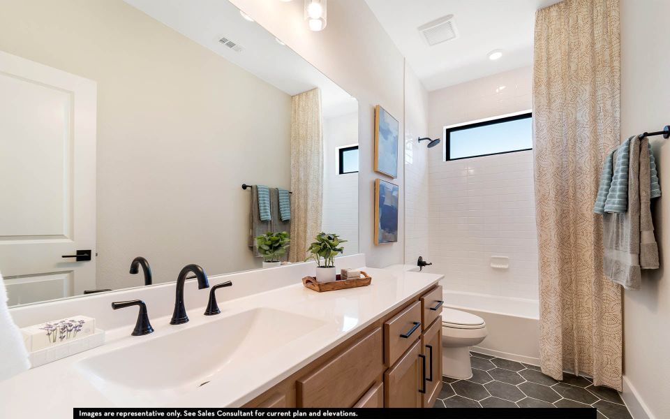 Furnished interior in a model home at The Summit at Center Stage in Keller (Image 17).