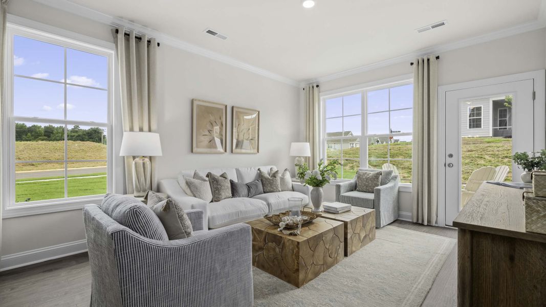 Furnished interior in a model home at The Meadows at Kinsley in Jamestown (Image 7).
